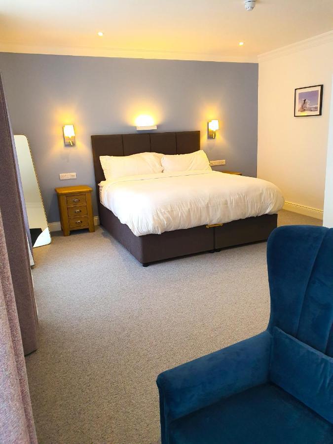 Bed and Breakfast Dingle Garden Townhouse Exterior foto A bedroom at the hotel
