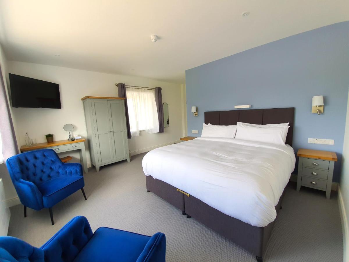 Bed and Breakfast Dingle Garden Townhouse Exterior foto A bedroom at The Old Mill